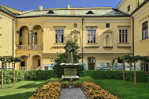 Poland, Krakow, Archbishop's Palace or Palac Biskupi, Palace courtyard with statue of Saint John Paul 2nd.