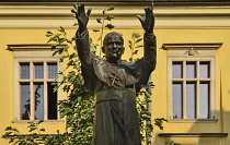 Poland, Krakow, Archbishop's Palace or Palac Biskupi, Palace courtyard with statue of Saint John Paul 2nd.