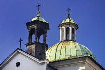 Poland, Krakow, Rynek Glowny or Main Market Square, Church of St Adalbert, detail of the domed roofscape.