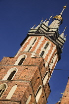 Poland, Krakow, Rynek Glowny or Main Market Square, St Mary's Church also known as St Marys Basilica, one of the church towers.