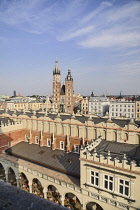 Poland, Krakow, Rynek Glowny or Main Market Square, View from the Town Hall Tower Observation deck over the Sukiennice or Cloth Hall to St Marys Church.