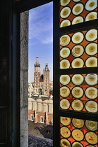 Poland, Krakow, Rynek Glowny or Main Market Square, View from the Town Hall Tower Observation deck over the Sukiennice or Cloth Hall to St Marys Church.