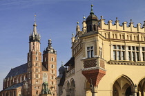 Poland, Krakow, Rynek Glowny or Main Market Square, A corner of the Cloth Hall with St Marys Church also known as St Marys Basilica.