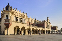 Poland, Krakow, Rynek Glowny or Main Market Square, General view of the square with the west side of the Sukiennice or The Cloth Hall.