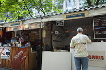 USA, New York State, New York City, Manhattan, Broadway Bites seasonal popup food stalls in Greeley Square Park.