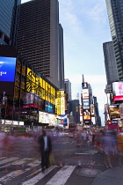 USA, New York State, New York City, Manhattan, Crowds of tourists in illuminated Times Square at night.