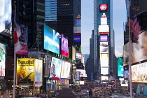 USA, New York State, New York City, Manhattan, Crowds of tourists in illuminated Times Square at night.