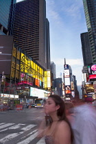 USA, New York State, New York City, Manhattan, Crowds of tourists in illuminated Times Square at night.