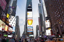 USA, New York State, New York City, Manhattan, Crowds of tourists in illuminated Times Square at night.