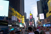 USA, New York State, New York City, Manhattan, Crowds of tourists in illuminated Times Square at night.