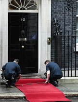 England, London, Rolling out the red carpet at 10 Downing Street.