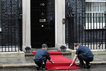 England, London, Rolling out the red carpet at 10 Downing Street.