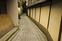 Japan, Kyoto, Traditional style buildings in Gion area, narrow alley off Gion winds, side walls.