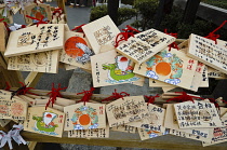 Japan, Tokyo, Hamamatsucho, Zojo-ji temple Ema , small wooden plaques with wishes for the coming year written on them.