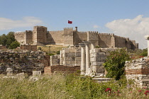 Turkey, Ayasuluk Castle on Ayasuluk Hill behind the ruins of Saint Johns Basilica, Selcuk, near Ephesus.