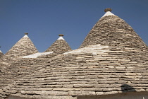 Italy, Puglia, Bari, Conical dry stone rooves of trulli houses, Rione Monti, Alberobello.