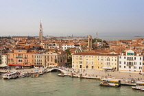 Italy, Venice. Panoramic view of buildings, rooftops, promenade and Canale di San Marco, near the Arsenale.