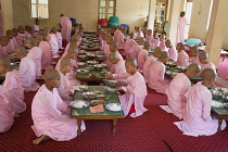 Myanmar, Mandalay, Nuns eating their meals, Sakyadhita Thilashin Nunnery School, Sagaing.