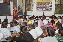 Myanmar, Mandalay, Buddhist monk teaching children, Mahagandhayon Monastic Institution, Amarapura.