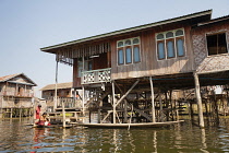 Myanmar, Shan State, Lakeside house built on stilts, Inle Lake.