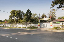 Myanmar, Yangon, Gated entrance to the home of Aung San Suu Kyi, 54 University Avenue.