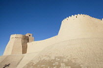 Uzbekistam, Khiva, Akshi Bobo, a tower of Kunya Ark, on left, and outer wall of Ichan Kala.