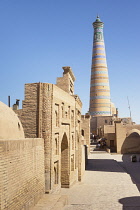 Uzbekistan, Khiva,Pahlavan Mahmud Mausoleum on left and Islam Khodja Minaret, Ichan Kala.