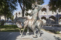 Uzbekistan, Bukhara, Statue of Khodja Nasreddin, also known as Hoja Nasruddin.