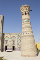 Uzbekistan, Bukhara, Ulugh Beg Minaret and Madrasah at Memorial Complex of Al Gijduvani, Gijduvan.