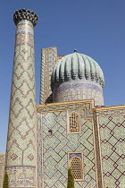 Uzbekistan, Samarkand, A minaret and dome of Sher Dor Madrasah, also known as Shir Dor Madrasah, Registan Square.