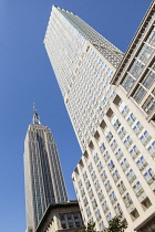 USA, New York City, Manhattan, Empire State Building and Langham Place Hotel, 5th Avenue.