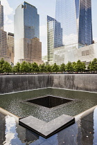 USA, New York City, Manhattan, One of the two waterfalls at National September 11 Memorial, World Trade Center.