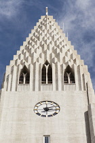 Iceland, Retkjavik,Clock on exterior of Hallgrimskirkja Church.