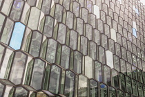 Iceland, Reykjavik, Glass front exterior of Harpa Concert Hall and Conference Centre.