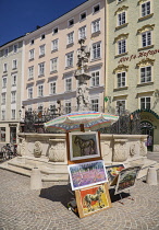 Austria, Salzburg, Alter Markt or the Old Market Place, Fountain with statue of St. Florian von Lorch on top.