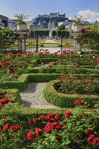 Austria, Salzburg, Mirabell Palace Gardens with the Festung Hohensalzburg Fortress in the background.