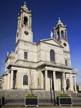 Ireland, County Westmeath, Athlone, Church of Saints Peter and Paul with the River Shannon.