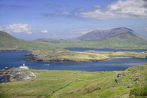 Ireland, County Kerry, Valentia Island, View towards the Iveragh Peninsula from Geokaun Mountain Park with Valentia Island Lighthouse on left.