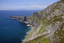 Ireland, County Kerry, Valentia Island, View towards Dingle Peninsula from Geokaun Mountain Park with Fogher Cliffs in foreground.