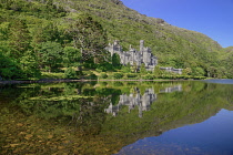 Ireland, County Galway, Connemara, Kylemore Abbey reflected in Kylemore Lough.