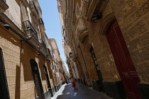 Spain, Andalucia, Cadiz, Narrow street in the old quarter of the city.