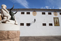 Spain, Andalucia, Cordoba, Detail of the sculpture for the matador Manuel Laureano Rodriguez Sanchez known as 'Manolete' on Plaza del Conde de Priego with a tiled image of the Virgin of Carmen in the...