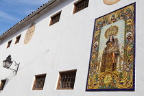 Spain, Andalucia, Cordoba, Tiled image of the Virgin of Carmen on Plaza del Conde de Priego .