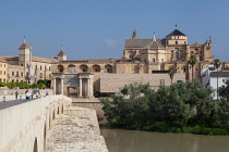 Spain, Andalucia, Cordoba, The Roman Bridge over the Guadalquivir River and the Mezquita Cathedral .