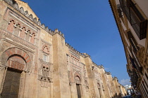 Spain, Andalucia, Cordoba, The external wall and doors to the Mezquita on Calle Magistral Glez Frances.
