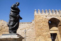 Spain, Andalucia, Cordoba, Statue of Lucius Seneca in front of the Puerta de Almovar.