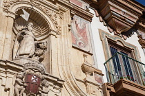 Spain, Andalucia, Cordoba, Statue on the facade of the Antiguo Convento de la Merced.