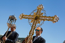 Spain, Andalucia, Granada, Crucifix carried at the head of the Corpus Christi procession from the Iglesia Santa Maria de la Alhambra.