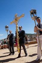 Spain, Andalucia, Granada, Crucifix carried at the head of the Corpus Christi procession from the Iglesia Santa Maria de la Alhambra.