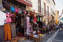 Spain, Andalucia, Granada, Souvenir shops on Caldereria Nueva in the Albayzin district.